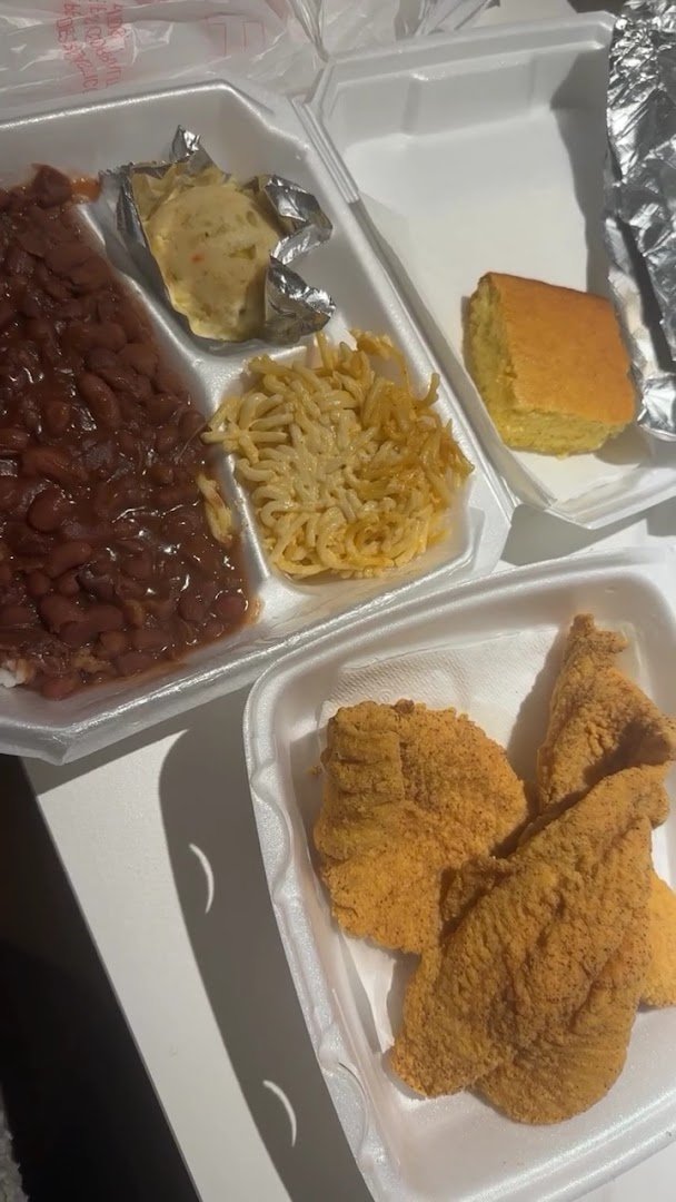 Takeout containers beside a simple meal spread.